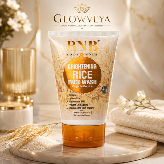 BNB Brightening Rice Face Wash on a luxury marble skincare setting with rice grains and wheat