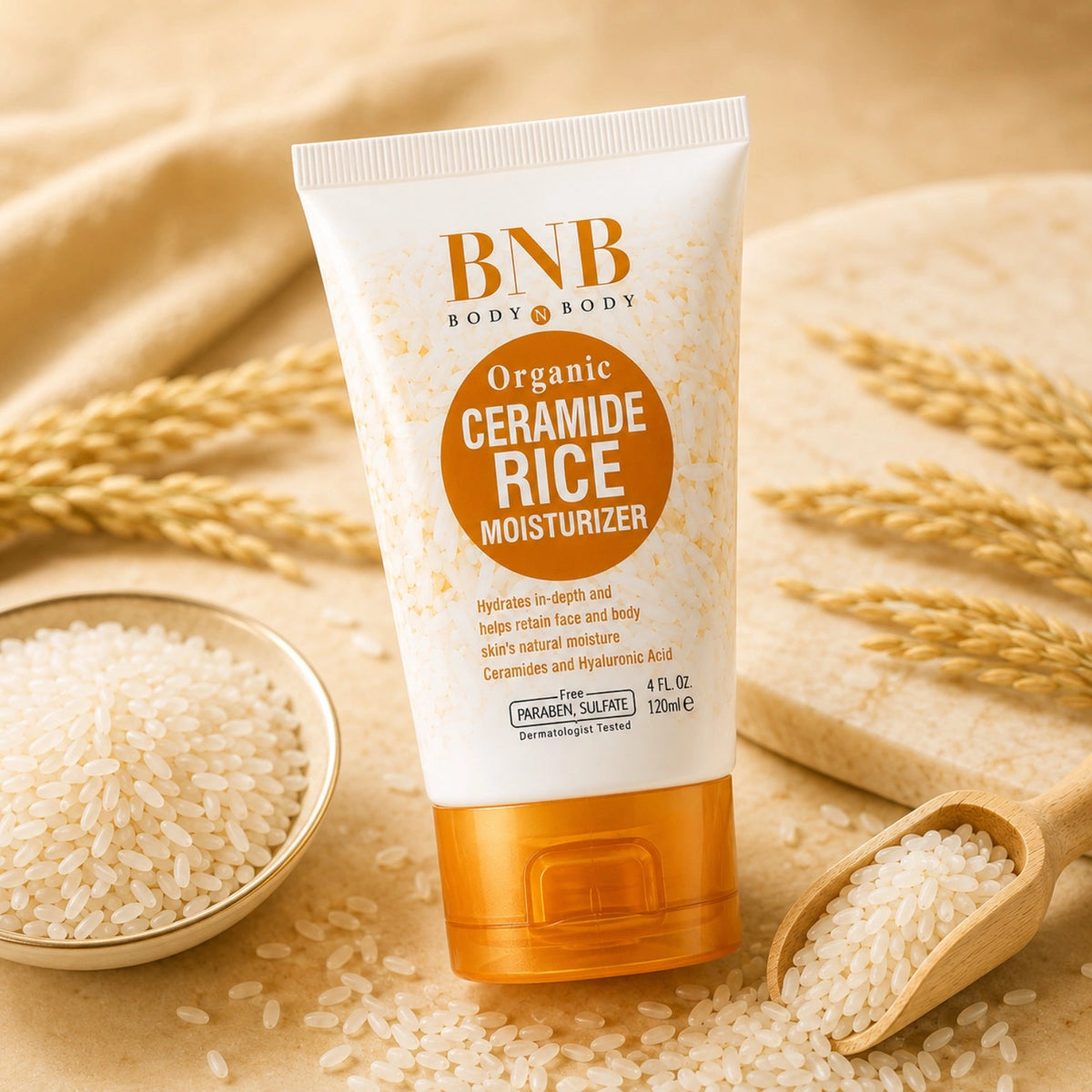 BNB Organic Ceramide Rice Moisturizer 120ml surrounded by rice grains in a luxury skincare setting