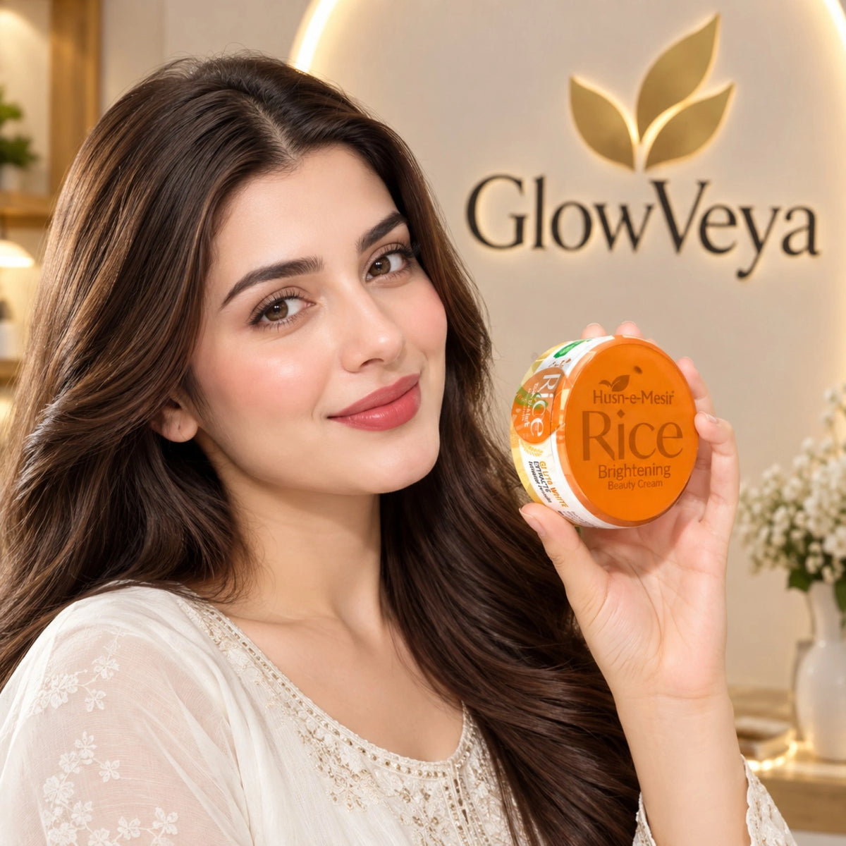 Husn-e-Mesir Rice Brightening Beauty Cream held by a model